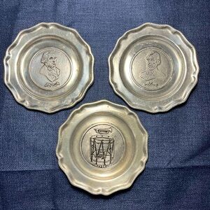 3 Pewter dishes, 5.5” diameter, scrolled rim, Washington, Lincoln,1776 drum.